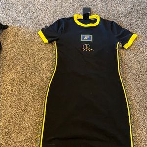 Black and yellow Nike dress, very fitted